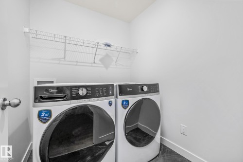 110 Honeysuckle Green, Leduc, AB - Indoor Photo Showing Laundry Room