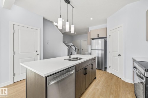 110 Honeysuckle Green, Leduc, AB - Indoor Photo Showing Kitchen With Double Sink With Upgraded Kitchen