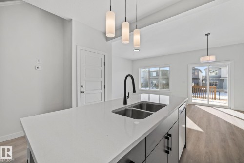 112 Honeysuckle Green, Leduc, AB - Indoor Photo Showing Kitchen With Double Sink