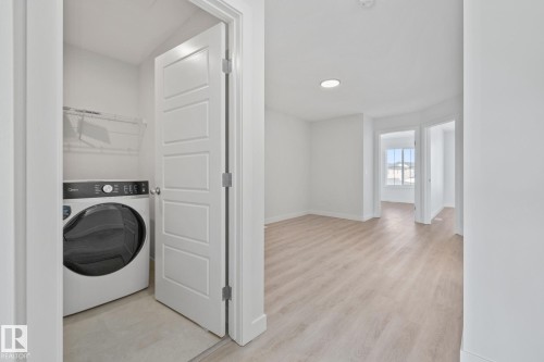 112 Honeysuckle Green, Leduc, AB - Indoor Photo Showing Laundry Room
