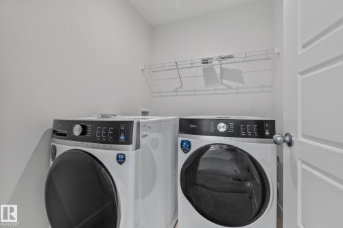 112 Honeysuckle Green, Leduc, AB - Indoor Photo Showing Laundry Room