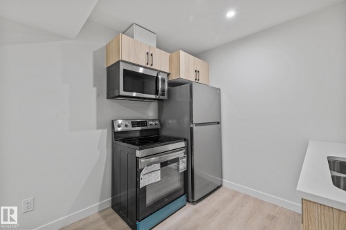 112 Honeysuckle Green, Leduc, AB - Indoor Photo Showing Kitchen