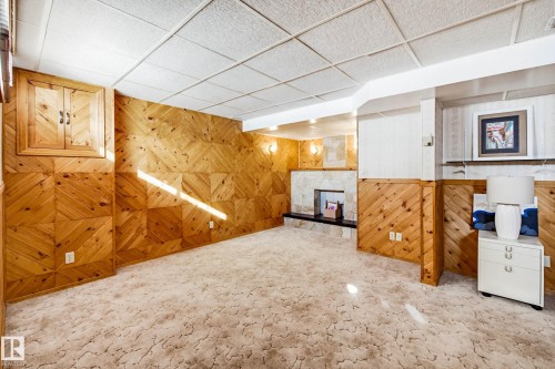 41 903 109 Street Nw, Edmonton, AB - Indoor Photo Showing Other Room With Fireplace