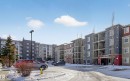 View of apartment building / complex featuring uncovered parking - 305 12045 22 Avenue, Edmonton, AB  - Outdoor With Facade 