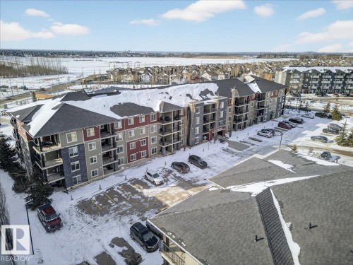 Snowy aerial view with a view of apartment building / complex - 305 12045 22 Avenue, Edmonton, AB - Outdoor With View
