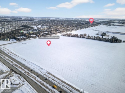 View of snowy aerial view - 305 12045 22 Avenue, Edmonton, AB - Outdoor With View