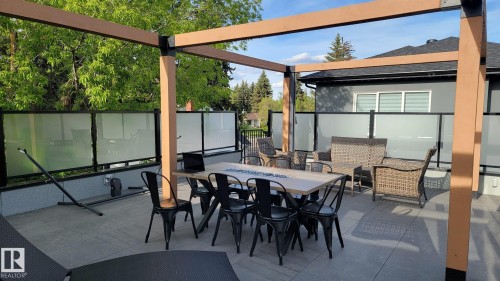 View of patio with outdoor dining area - 10038 142 Street, Edmonton, AB - Outdoor With Deck Patio Veranda With Exterior