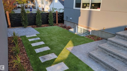 Fenced yard featuring a patio area - 10038 142 Street, Edmonton, AB - Outdoor