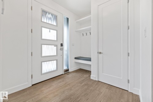 Entryway with light wood-style flooring - 10038 142 Street, Edmonton, AB - Indoor Photo Showing Other Room
