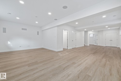 Unfurnished room with recessed lighting and light wood finished floors - 10038 142 Street, Edmonton, AB - Indoor Photo Showing Other Room