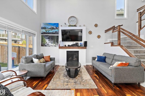 3380 Chickadee Drive, Edmonton, AB - Indoor Photo Showing Living Room With Fireplace