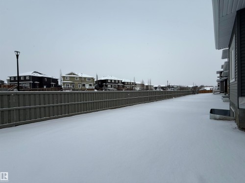 View of yard with a residential view - 3158 Magpie Way, Edmonton, AB - Outdoor