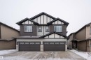 Craftsman inspired home featuring driveway and an attached garage - 43 1703 16 Avenue, Edmonton, AB  - Outdoor With Facade 