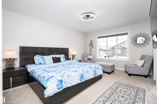 Bedroom featuring light colored carpet and baseboards - 43 1703 16 Avenue, Edmonton, AB - Indoor Photo Showing Bedroom
