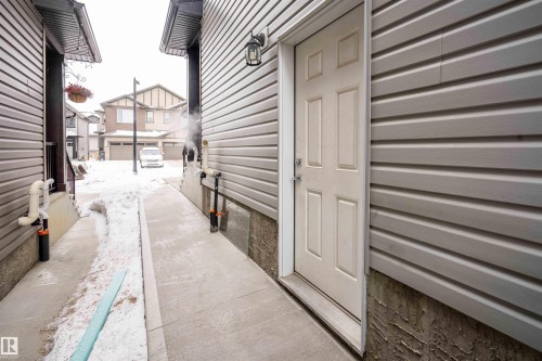 Doorway to property - 43 1703 16 Avenue, Edmonton, AB - Outdoor With Exterior