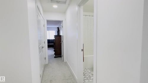 21 7110 Keswick Common, Edmonton, AB - Indoor Photo Showing Other Room