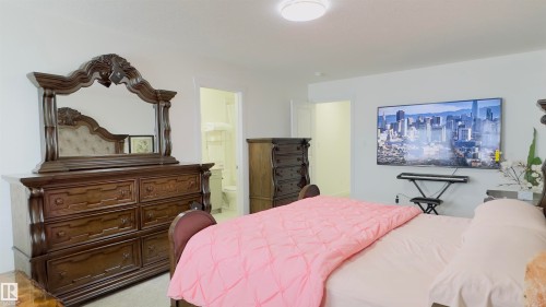 21 7110 Keswick Common, Edmonton, AB - Indoor Photo Showing Bedroom