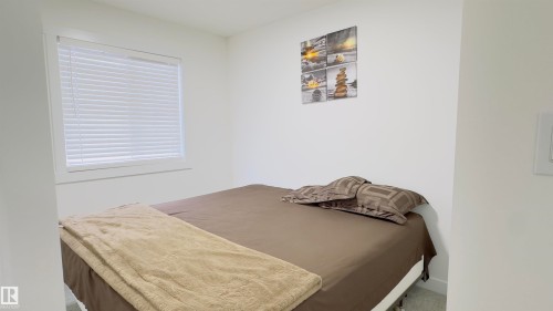 21 7110 Keswick Common, Edmonton, AB - Indoor Photo Showing Bedroom