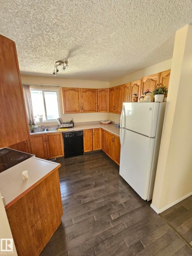 Edmonton, AB - Indoor Photo Showing Kitchen With Double Sink