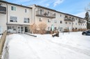 Snow covered house featuring a balcony - 201 237 Woodvale Road W, Edmonton, AB  - Outdoor 