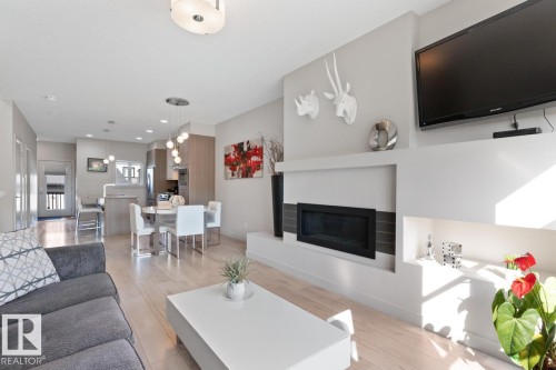 3 Kenton Way, Spruce Grove, AB - Indoor Photo Showing Living Room With Fireplace