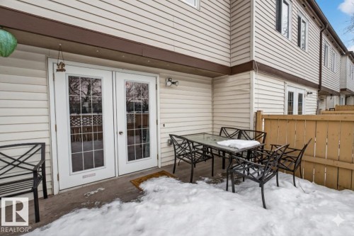View of patio with french doors and a deck - 14648 54 Street, Edmonton, AB - Outdoor With Deck Patio Veranda With Exterior