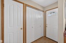Entryway featuring a textured ceiling and tile patterned flooring - 14648 54 Street, Edmonton, AB  - Indoor Photo Showing Other Room 