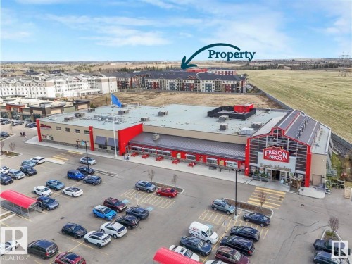 Drone / aerial view of a commercial area - 422 5816 Mullen Place, Edmonton, AB - Outdoor With View