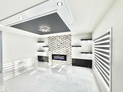 1836 22 Street, Edmonton, AB - Indoor Photo Showing Other Room With Fireplace