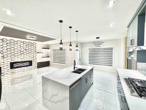 1836 22 Street, Edmonton, AB - Indoor Photo Showing Kitchen With Fireplace With Double Sink With Upgraded Kitchen