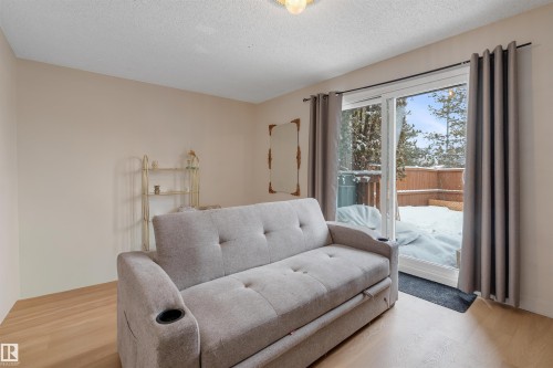 101 16725 106 Street, Edmonton, AB - Indoor Photo Showing Living Room