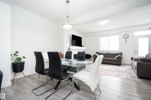 Dining area featuring light wood-type flooring - 24 2072 Wonnacott Way, Edmonton, AB - Indoor