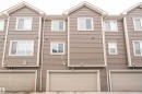 View of front of house featuring a garage - 24 2072 Wonnacott Way, Edmonton, AB  - Outdoor 
