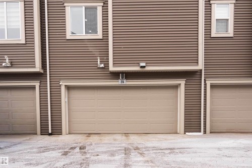 View of garage - 24 2072 Wonnacott Way, Edmonton, AB - Outdoor With Exterior