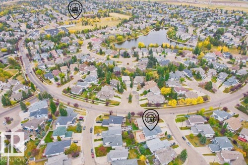 Aerial view of property's location with nearby suburban area and a large body of water - 11608 11A Avenue, Edmonton, AB -  With View