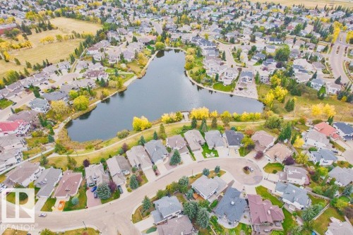 Aerial view of property's location with nearby suburban area and a nearby body of water - 11608 11A Avenue, Edmonton, AB - Outdoor With Body Of Water With View
