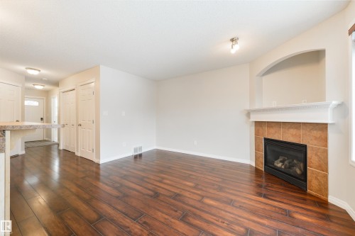 114 Hartwick Loop, Spruce Grove, AB - Indoor Photo Showing Living Room With Fireplace
