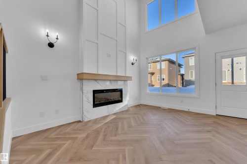 3608 40 Avenue, Beaumont, AB - Indoor Photo Showing Other Room With Fireplace