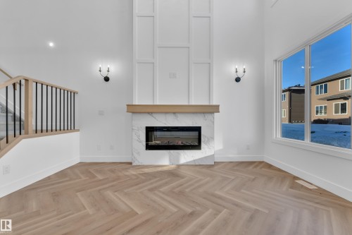 3608 40 Avenue, Beaumont, AB - Indoor Photo Showing Living Room With Fireplace