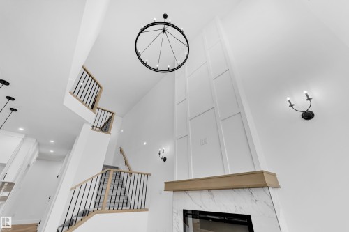 3608 40 Avenue, Beaumont, AB - Indoor Photo Showing Other Room With Fireplace