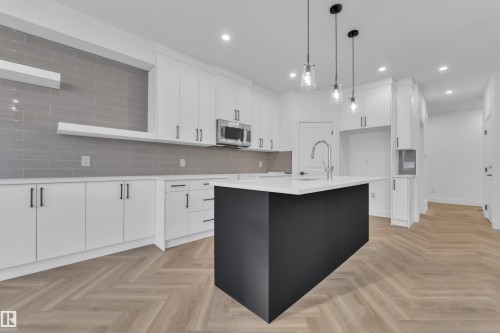 3608 40 Avenue, Beaumont, AB - Indoor Photo Showing Kitchen With Upgraded Kitchen