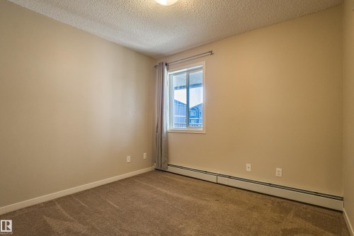 211 1820 Rutherford Road, Edmonton, AB - Indoor Photo Showing Other Room