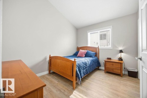62 Pointe, Beaumont, AB - Indoor Photo Showing Bedroom