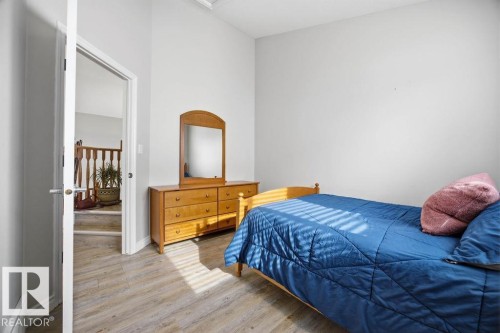 62 Pointe, Beaumont, AB - Indoor Photo Showing Bedroom