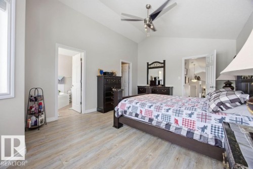 62 Pointe, Beaumont, AB - Indoor Photo Showing Bedroom