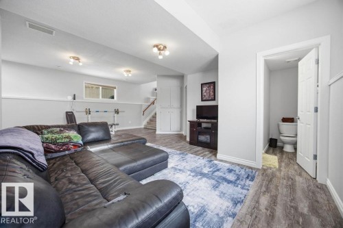62 Pointe, Beaumont, AB - Indoor Photo Showing Living Room