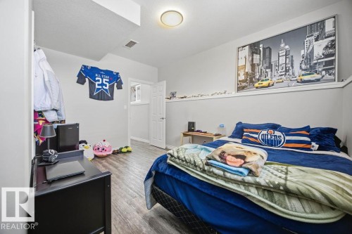 62 Pointe, Beaumont, AB - Indoor Photo Showing Bedroom