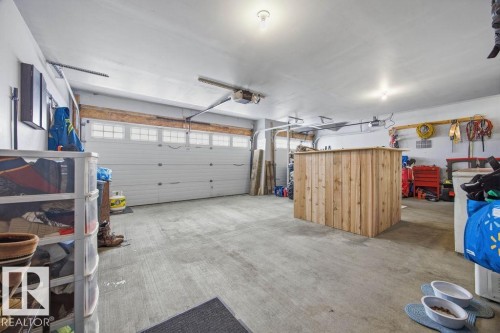 62 Pointe, Beaumont, AB - Indoor Photo Showing Garage