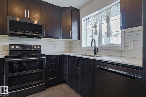 31 20 Augustine Crescent, Sherwood Park, AB - Indoor Photo Showing Kitchen With Double Sink