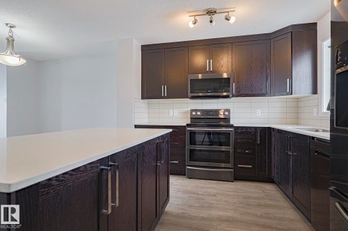 31 20 Augustine Crescent, Sherwood Park, AB - Indoor Photo Showing Kitchen With Upgraded Kitchen